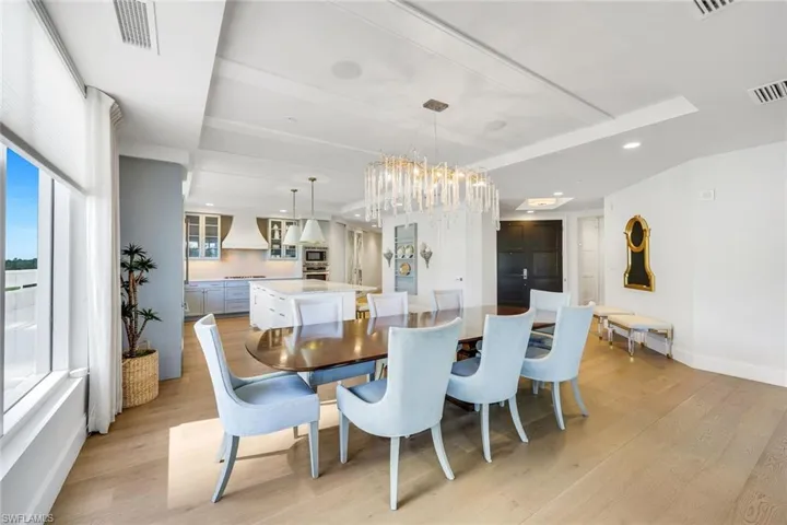 The dining room sits alongside the open kitchen, where meals can easily be served.