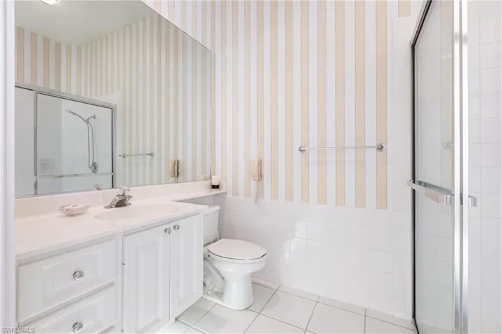 His side of master bathroom.