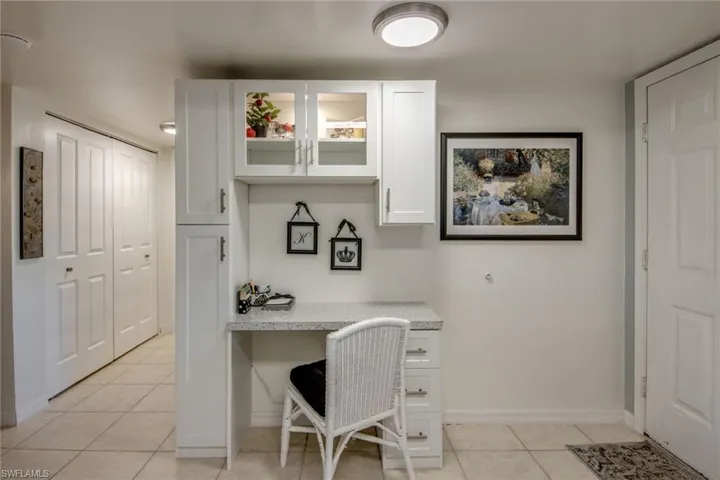 Kitchen features a brand new built in desk and cabinet area for your convenience