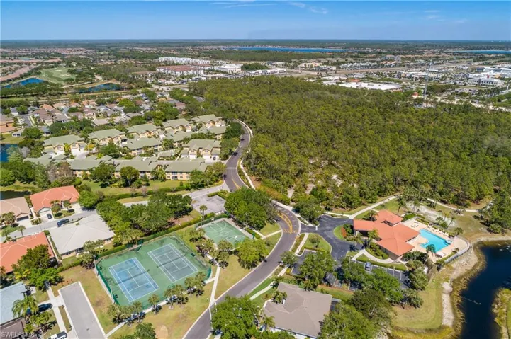 Community aerial view tennis Basketball club house with fitness room.