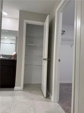 Closet featuring a sink