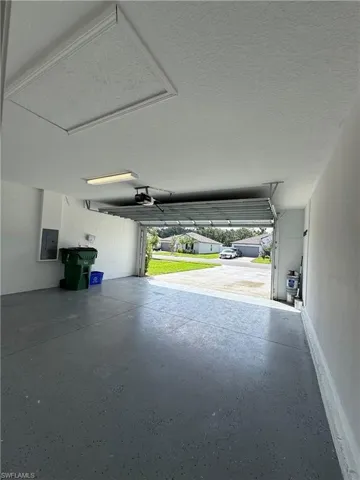 Garage with concrete block wall and electric panel