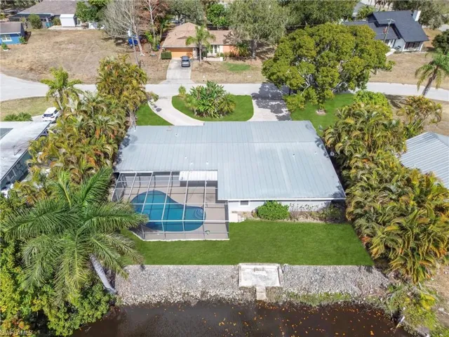 View from above of property with a pool area