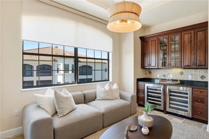 The bar area can double as a sitting area or breakfast room