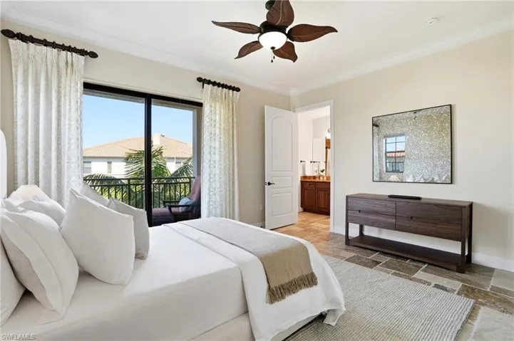 The second suite features a small open lanai, bathroom and walk in closet