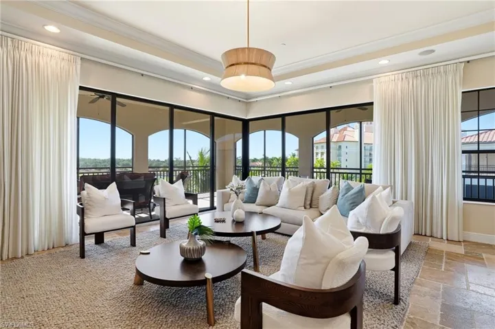 Over 10 foot high ceilings with floor to ceiling zero sliders with the focal point being the view