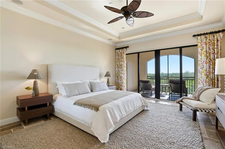 The primary suite offer french sliding doors to the wraparound lanai