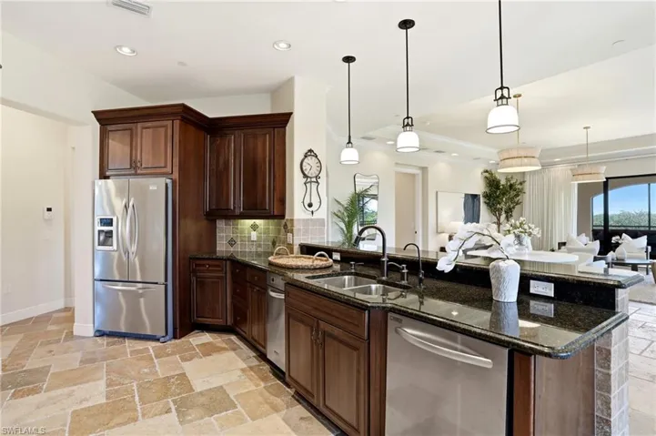 The chef of the home will appreciate being a part of the gathering while also taking in incredible views