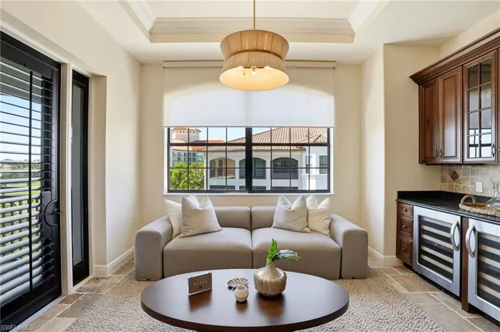 located off the kitchen with lanai access, this sitting area is inviting and comfortable