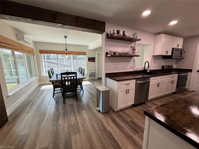 Kitchen featuring a stainless steel appliances, and sink