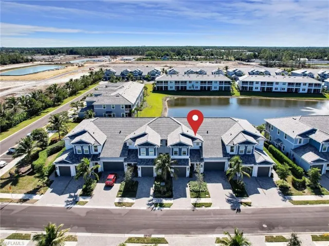 Bird's eye view featuring a water view and a residential view