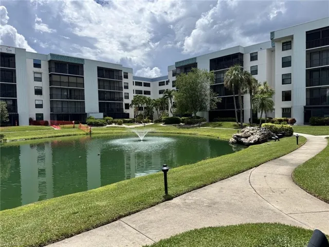 View looking from the pool towards this units building.