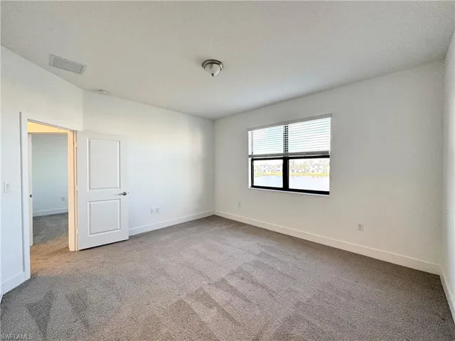Spare room featuring carpet floors