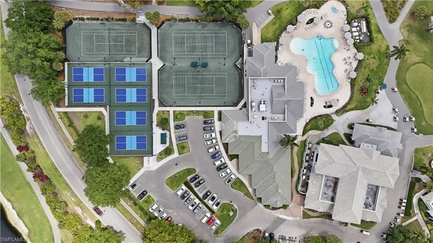 The clubhouse features SIX pickleball courts and THREE tennis courts.