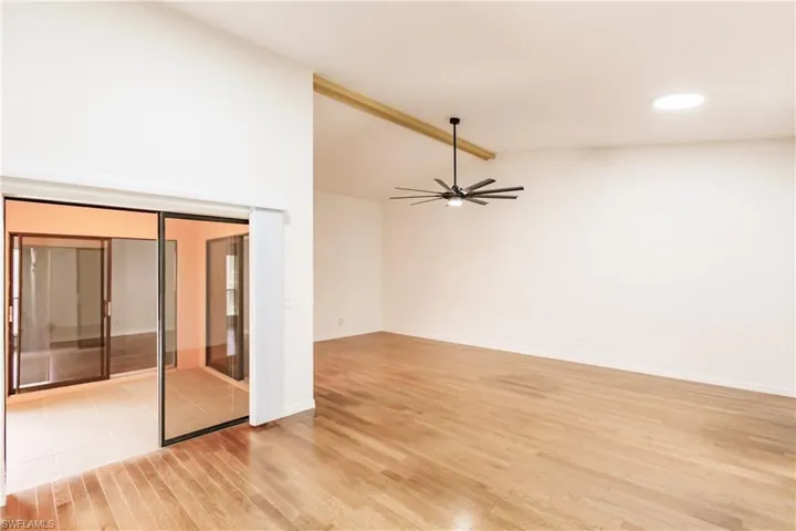Spacious living room/dining area opening onto the lanai. Love the air flow!