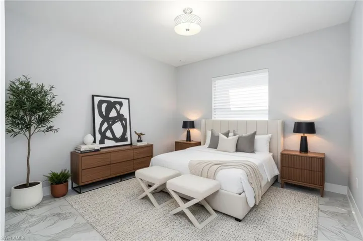 Photo includes virtual staging to showcase the possibility of the bedroom.