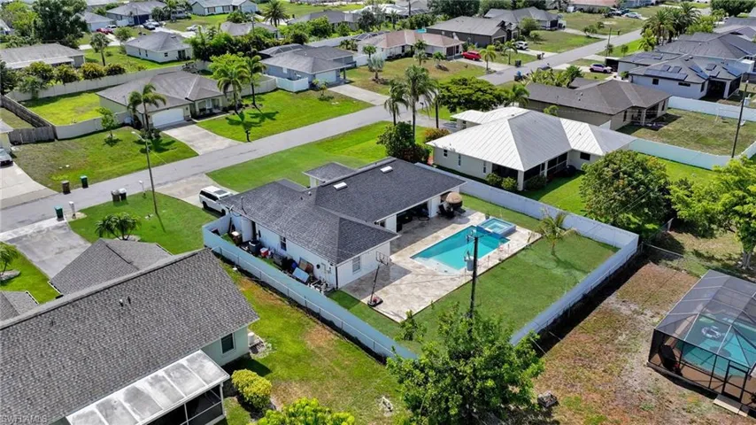 Aerial view of residential area with a pool area
