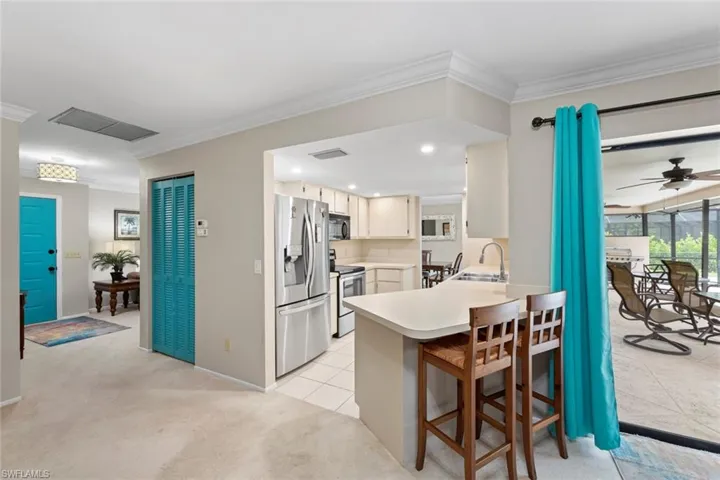 Kitchen pantry behind folding doors