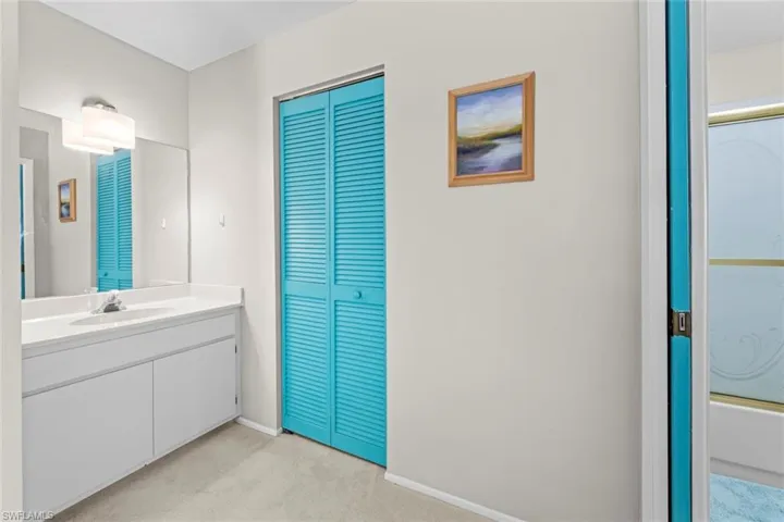 Master walk-in closet behind door