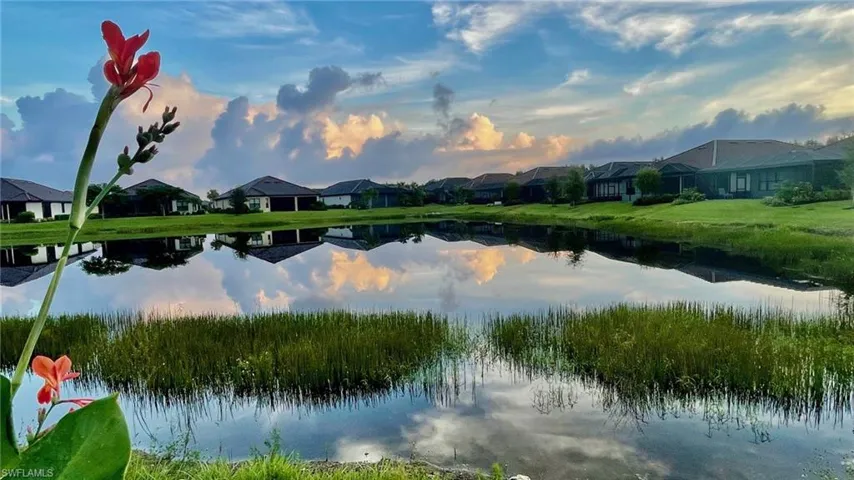 Water view featuring nearby suburban area