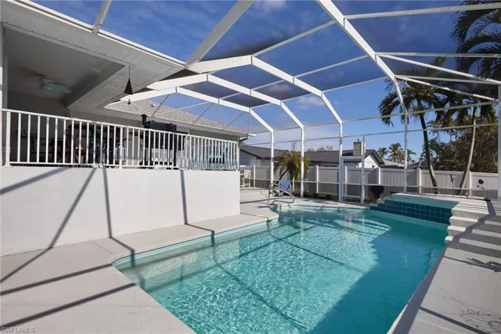 View of pool looking up to deck area
