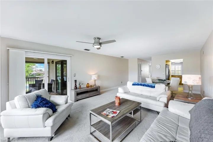 Living room with sliding door to lanai.