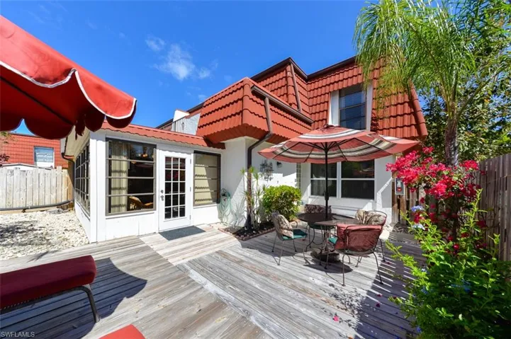 Large Private Courtyard with Patio Tables, Umbrellas and lounge chairs. Your Private Slice of Paradise in the Sun!