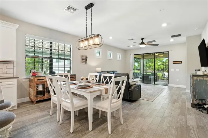 Dining room featuring recessed lighting, light wood finished floors, and a ceiling fan