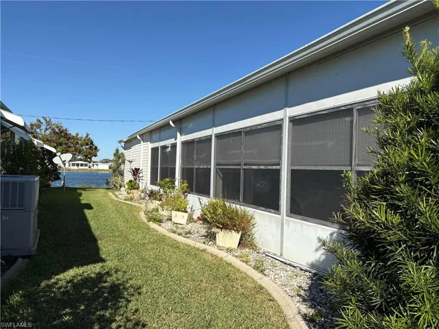 View of yard featuring central AC unit