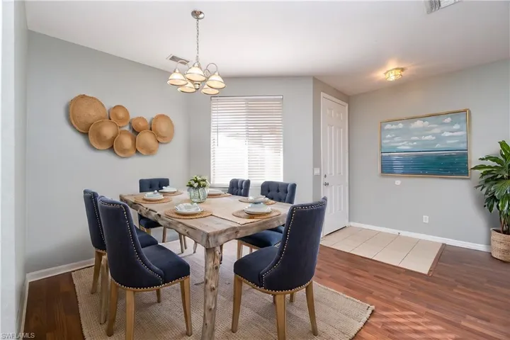 Dining photo has been virtually staged