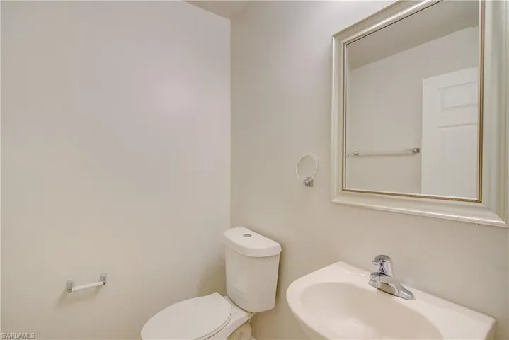 Bathroom with sink and toilet