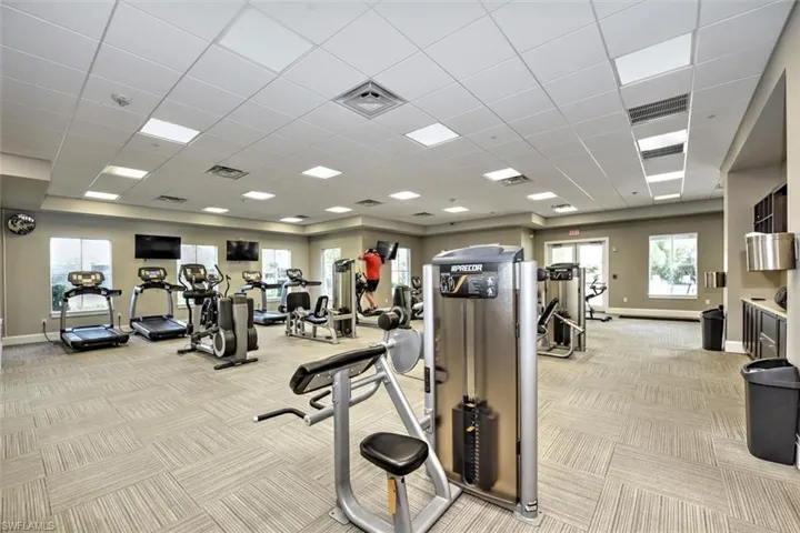 Exercise room featuring a paneled ceiling