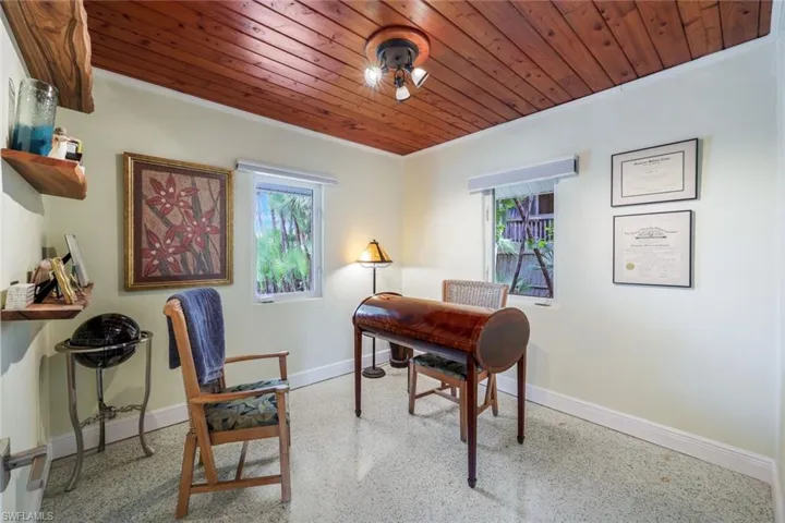 Office space featuring wood ceiling