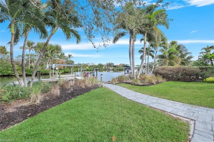 View of yard with a water view of Racoon Bay and Imperial River