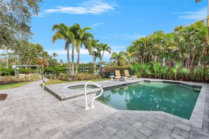 View of pool featuring an in ground hot tub and a patio area