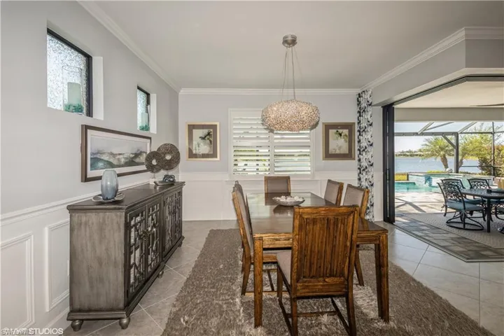 Tiled dining space with ornamental molding