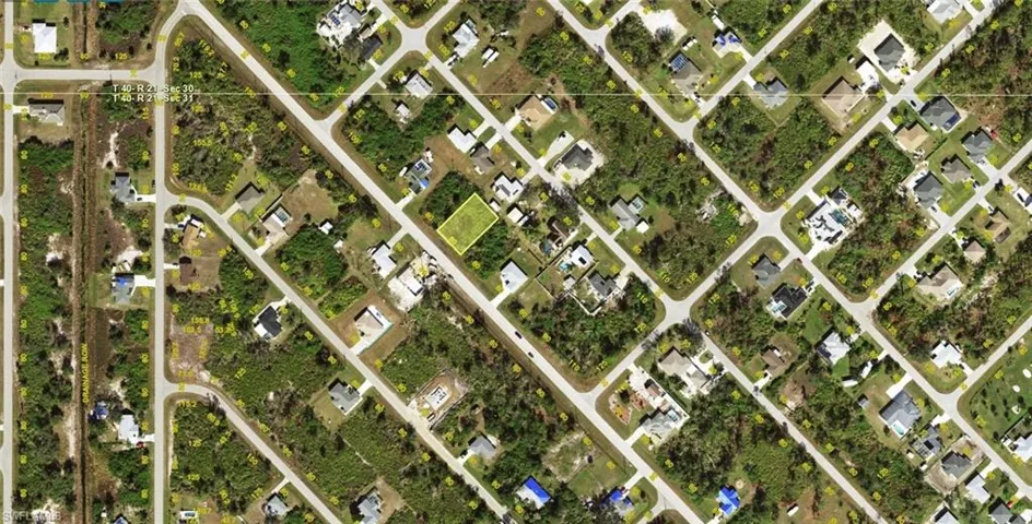 Aerial Survey. Depicting the property within its surrounding area and displaying parcel boundaries