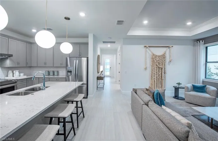 Virtual/Staged photos show are of a similar model, not of the actual home.