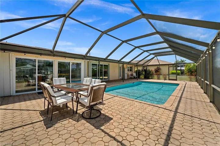 Paver pool deck, large lanai and pool, all screened in!