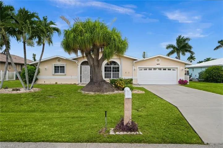 Mature landscaping throughout the yard