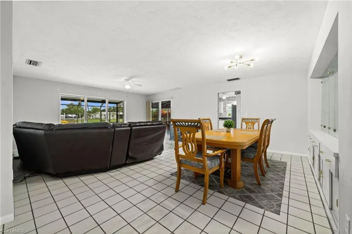 The view of the dining and living rooms as you enter