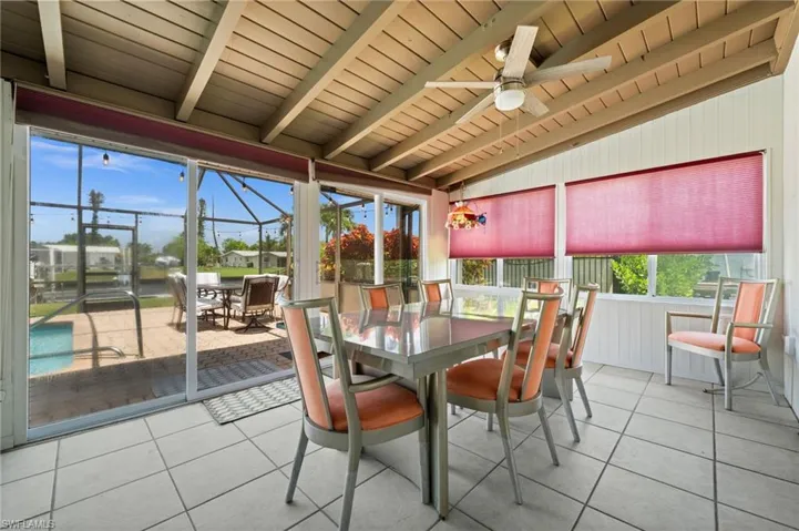 The enclosed sunroom is a great place for your morning coffee. It has doors and windows and can be under AC.