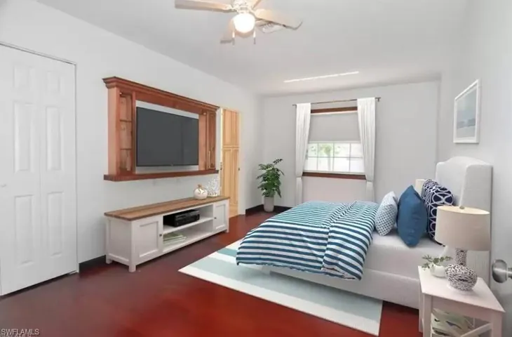 Bedroom featuring ceiling fan