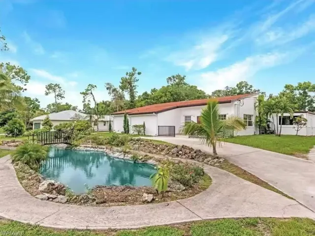 Swimming pool with a patio area