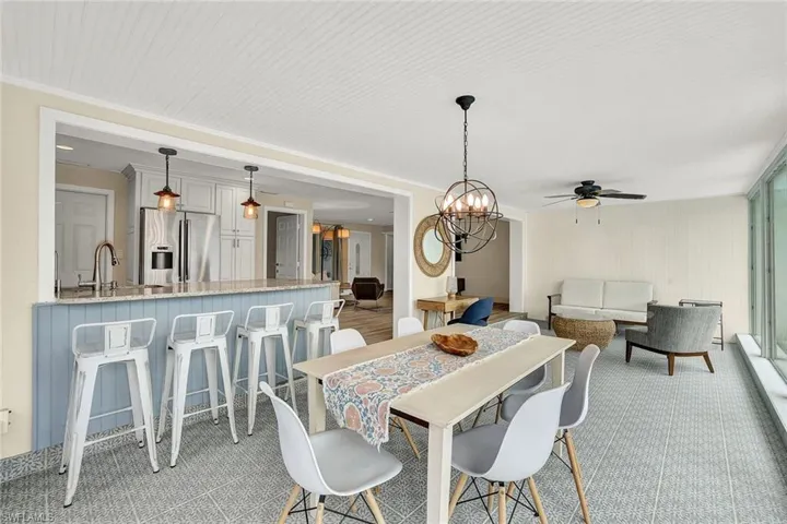 Dining area and kitchen are open to one another.