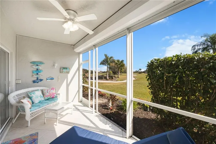 Sunroom / solarium featuring a ceiling fan