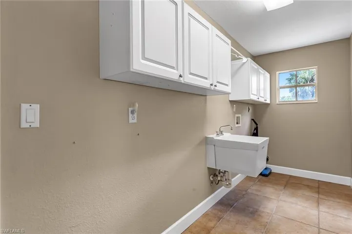 Laundry room cabinets & sink