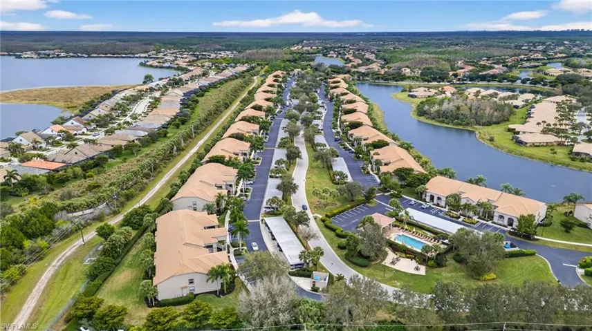 Aerial overview of property's location with nearby suburban area and a large body of water