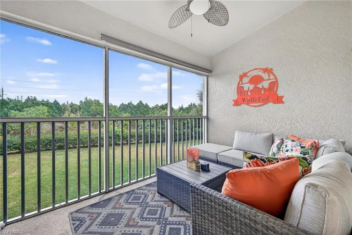 Balcony/lanai with cozy sectional