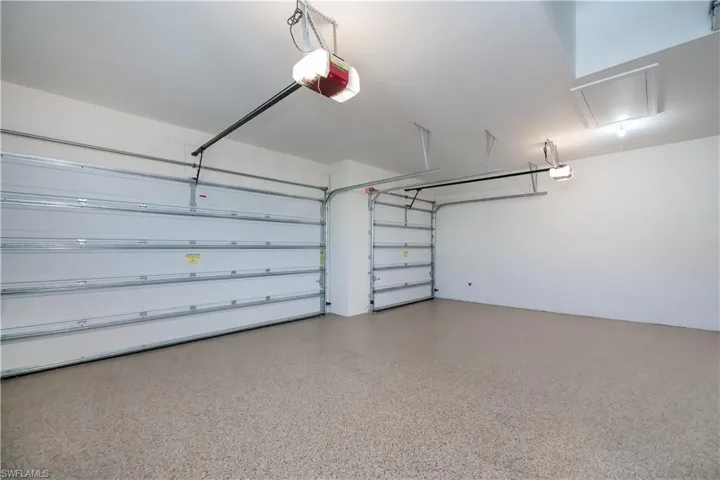 Three car garage with Epoxy Flake Flooring